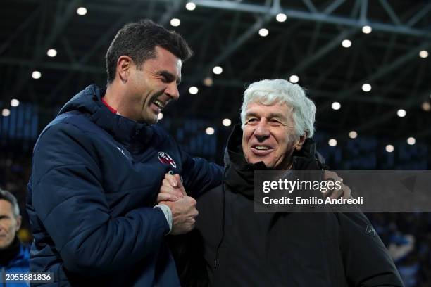 Thiago Motta, Head Coach of Bologna FC, interacts with Gian Piero Gasperini, Head Coach of Atalanta BC, during the Serie A TIM match between Atalanta...