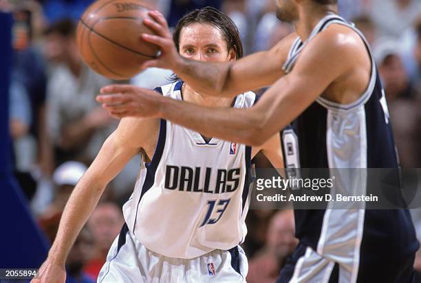 Steve Nash of the Dallas Mavericks guards Tony Parker of the San Antonio Spurs in game three of the Western Conference Finals during the 2003 NBA...