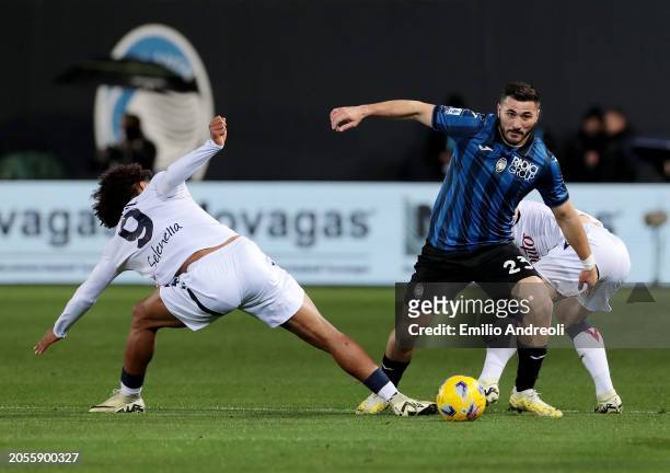 Sead Kolasinac of Atalanta BC is challenged by Joshua Zirkzee of Bologna FC during the Serie A TIM match between Atalanta BC and Bologna FC - Serie A...