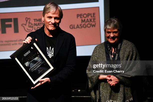 Director Viggo Mortensen receives the festival's inaugural Cinema City Honorary Award from Festival Director, Allison Gardner in recognition of his...