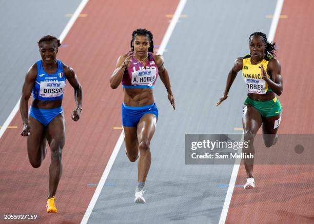 Zaynab Dosso of Italy, Aleia Hobbs of the United States and Shashalee Forbes of Jamaica compete in the Women's 60m Semi Final during day two of the...