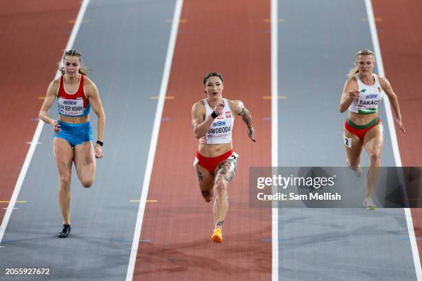 Patrizia Van Der Weken of Luxembourg, Ewa Swoboda of Poland and Boglarka Takacs of Hungray compete in the Women's 60m Semi Final during day two of...