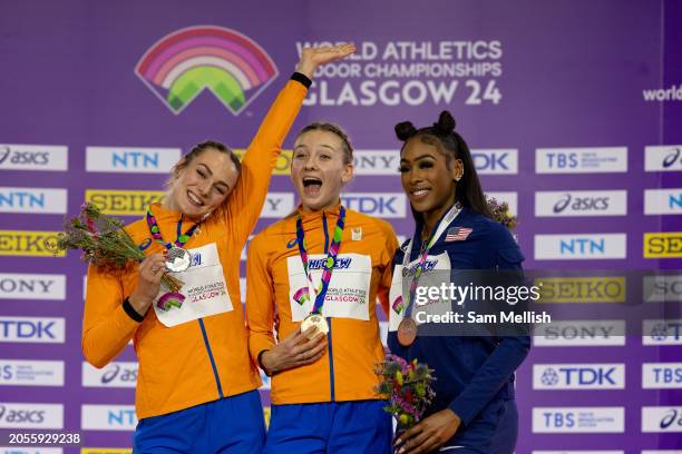 Lieke Klaver of the Netherlands, Femke Bol of the Netherlands and Alexis Holmes of the United States pose for during the medal ceremony for the...