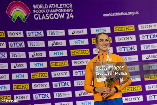 Silver medalist, Lieke Klaver of the Netherlands poses for photos during the medal ceremony for the Womens 3000m Final during day two of the World...