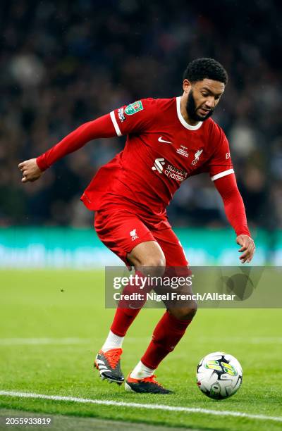 Joe Gomez of Liverpool on the ball during the Carabao Cup Final match between Chelsea and Liverpool at Wembley Stadium on February 25, 2024 in...