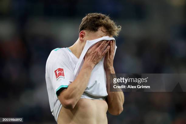 Senne Lynen of SV Werder Bremen shows dejection during the Bundesliga match between TSG Hoffenheim and SV Werder Bremen at PreZero-Arena on March 03,...