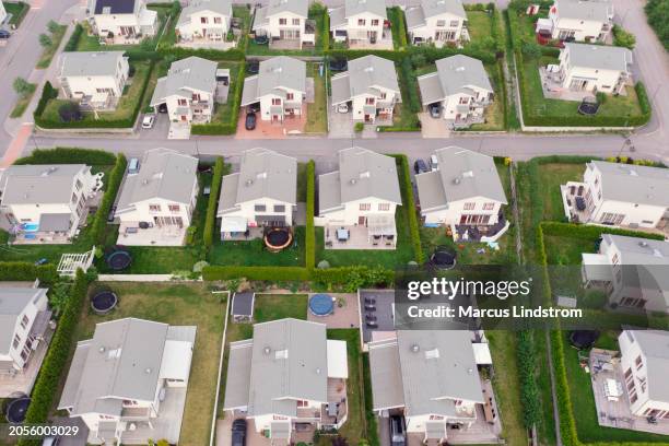 aerial view of a modern residential area with white houses - district stock pictures, royalty-free photos & images