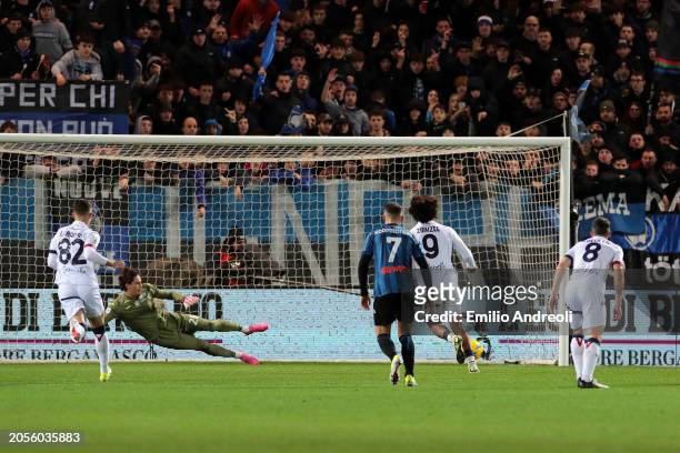 Marco Carnesecchi of Atalanta BC fails to save a penalty from Joshua Zirkzee of Bologna FC as he scores his teams first goal during the Serie A TIM...