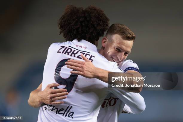 Lewis Ferguson of Bologna FC celebrates with team mate Joshua Zirkzee after scoring to give the side a 2-1 lead during the Serie A TIM match between...