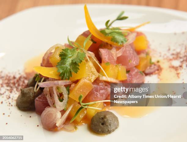 Tuna tartare, golden beetroot, beluga dahl, cured egg yolk sumac, chile oil at Malcolm's restaurant on Union St. On Wednesday April 25, 2018 in...