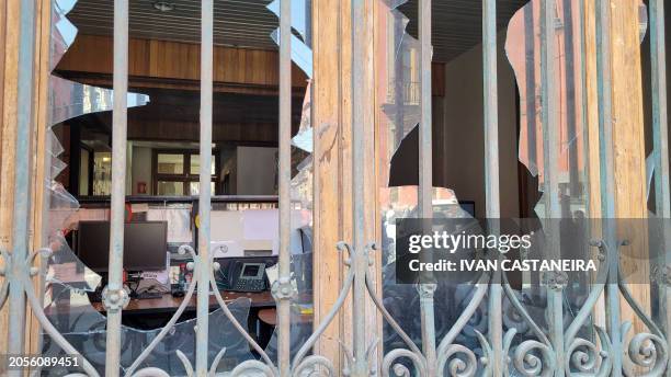 View of the destruction caused by demonstrators at the presidential palace in Mexico City on March 6 during a protest over the disappearance of the...