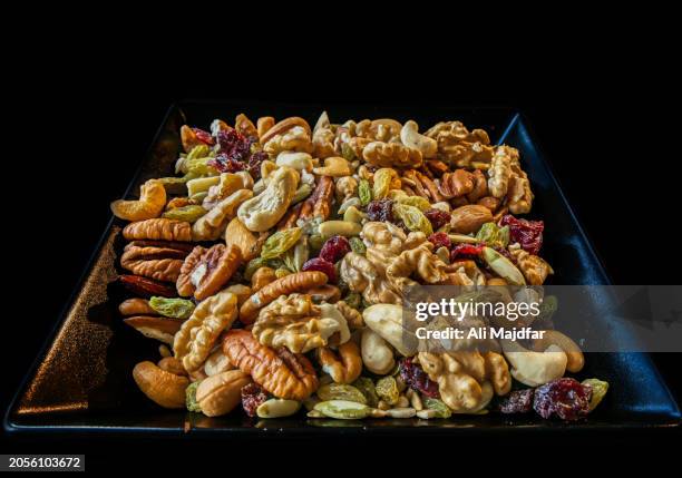 nuts for breakfast - cashew pieces stock pictures, royalty-free photos & images