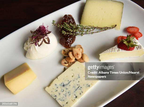 Cheese and Fruit plate at Downtown Social on Thursday, Aug. 16, 2018 in Glens Falls, N.Y. An assortment of hard and soft sheep, cow, and goat milk...