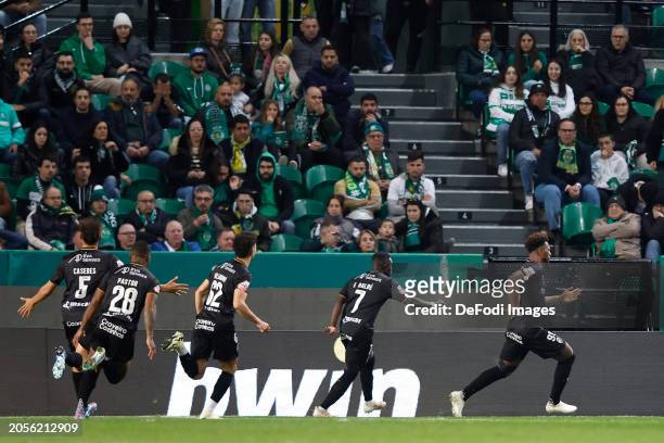Ze Luis of SC Farense celebrates after scoring his team's second goal during the Liga Portugal Bwin match between Sporting CP and SC Farense at...