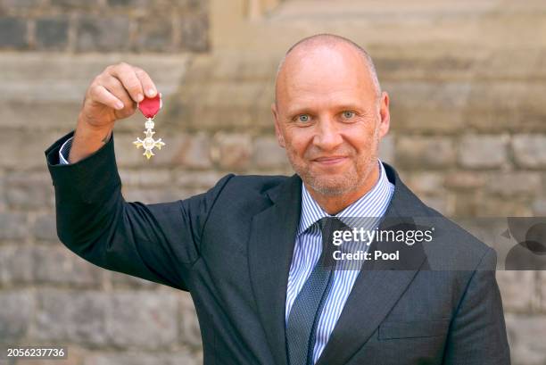 Simon Rogan after being made a Member of the Order of the British Empire during an investiture ceremony at Windsor Castle, on March 06, 2024 in...