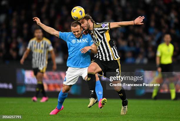 Stanislav Lobotka of SSC Napoli battles for possession with Manuel Locatelli of Juventus during the Serie A TIM match between SSC Napoli and Juventus...