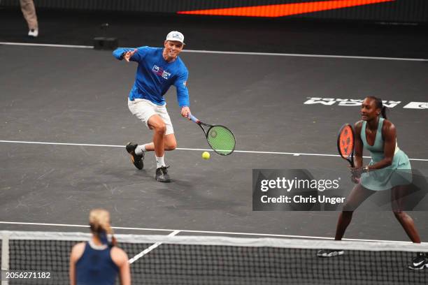 Bob Bryan and Asia Muhammad in action during The Netflix Slam at Michelob ULTRA Arena on March 03, 2024 in Las Vegas, Nevada.