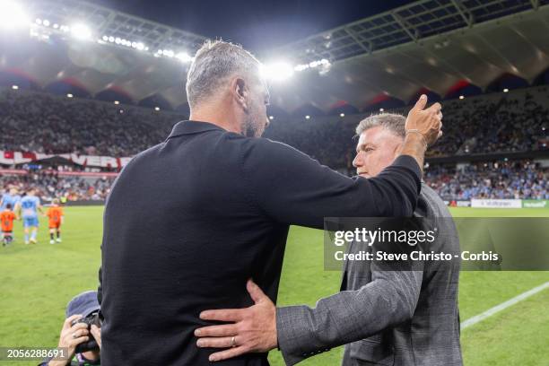 Ufuk Talay coach of Sydney FC hugs Wanderers coach Marko Rudan during the A-League Men round 19 match between Western Sydney Wanderers and Sydney FC...