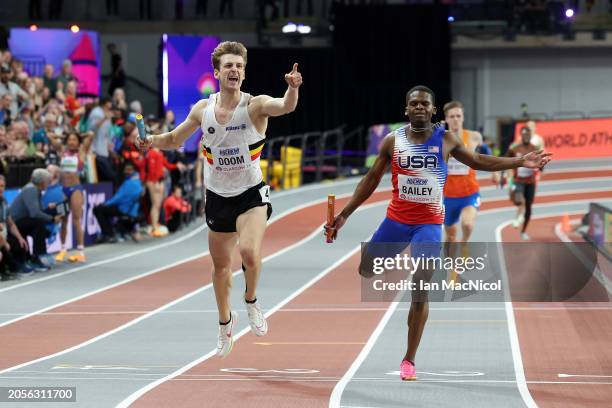 Gold medalist Alexander Doom of Team Belgium celebrates ahead of silver medalist Christopher Bailey of Team United States whilst crossing the finish...