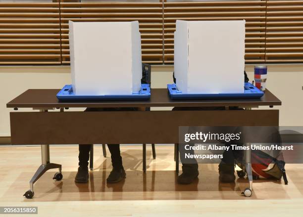 Students fill out ballots to vote in the multi-purpose room at University at Albany on election night on Tuesday, Nov. 6, 2018 in Albany, N.Y.