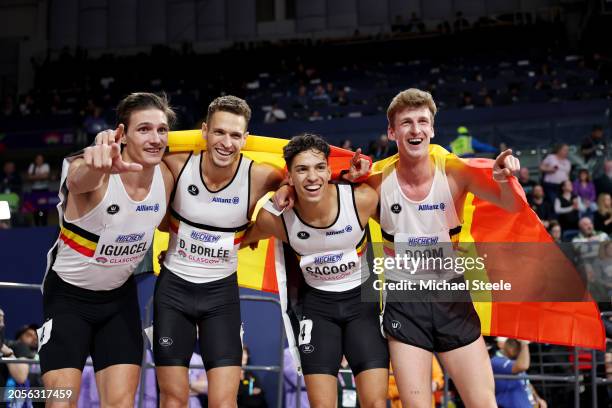 Gold medalists Christian Iguacel, Dylan Borlee, Jonathan Sacoor and Alexander Doom of Team Belgium pose for a photo after winning in the Men's 4x400...