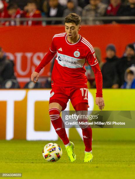 Brian Gutierrez of Chicago Fire dribbles the ball during a game between FC Cincinnati and Chicago Fire FC at Soldier Field on March 2, 2024 in...