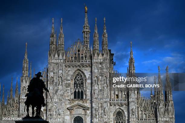 This photograph shows the Cathedral Duomo di Milano on Piazza del Duomo in Milan on March 6, 2024.