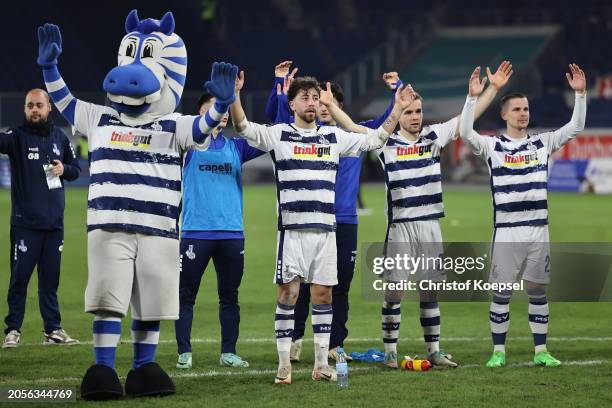 The team of Duisburg celebrates after winning 2-1 the 3. Liga match between MSV Duisburg and Borussia Dortmund II at Schauinsland-Reisen-Arena on...