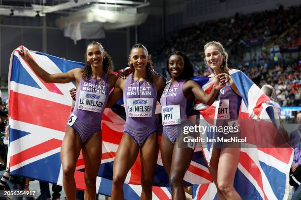 Bronze medalists Lina Nielsen, Laviai Nielsen, Ama Pipi and Jessie Knight of Team Great Britain pose for a photo after the Women's 4x400 Metres Relay...