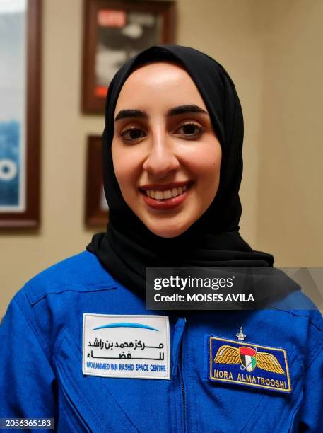 Nora Almatrooshi, the United Arab Emirates' first female astronaut to graduate from NASA, poses after an interview with AFP at the Johnson Space...