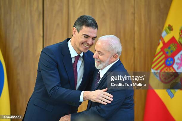 President of Brazil Luiz Inácio Lula da Silva and Prime Minister of Spain Pedro Sanchez greet during a press conference at the Planalto Palace on...