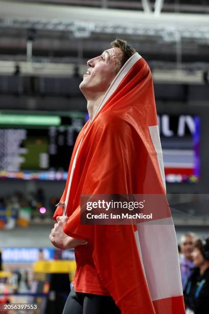 Gold medalist Simon Ehammer of Team Switzerland reacts after the 1000 Metres leg in the Heptathlon on Day Three of the World Athletics Indoor...