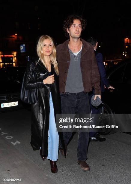 Sienna Miller and Oli Green are seen arriving to the Frame Paris Fashion Week dinner at Caviar Kaspia on March 03, 2024 in Paris, France.