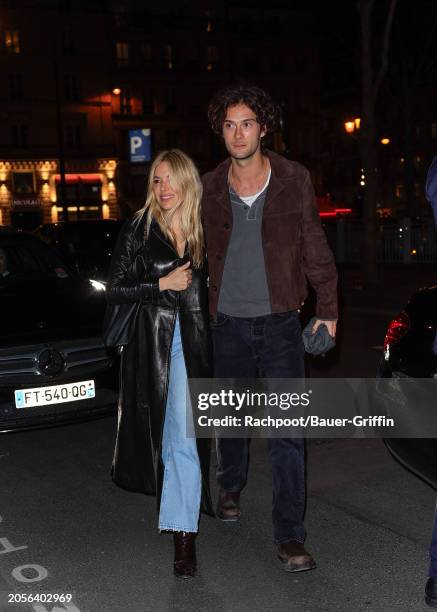 Sienna Miller and Oli Green are seen arriving to the Frame Paris Fashion Week dinner at Caviar Kaspia on March 03, 2024 in Paris, France.