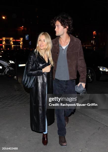 Sienna Miller and Oli Green are seen arriving to the Frame Paris Fashion Week dinner at Caviar Kaspia on March 03, 2024 in Paris, France.