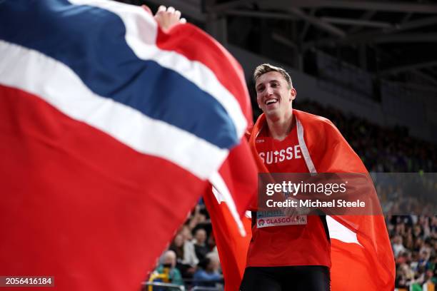 Gold medalist Simon Ehammer of Team Switzerland celebrates after the 1000 Metres leg in the Heptathlon on Day Three of the World Athletics Indoor...