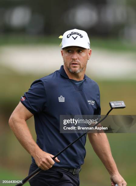 Alex Noren of Sweden walks from the second green during the final round of The Cognizant Classic in The Palm Beaches at PGA National Resort And Spa...