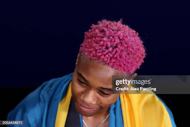 Devynne Charlton of Team Bahamas speaks to the media after winning and setting a new world record in the Women's 60 Metres Hurdles Final on Day Three...