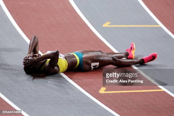 Bronze medalist Noelie Yarigo of Team Benin reacts after crossing the finish line in the Women's 400 Metres Final on Day Three of the World Athletics...