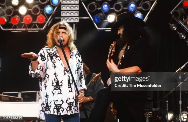 Johnny Van Zandt and Gary Rossington of the Lynyrd Skynyrd perform at Shoreline Amphitheatre on July 28, 1994 in Mountain View, California.