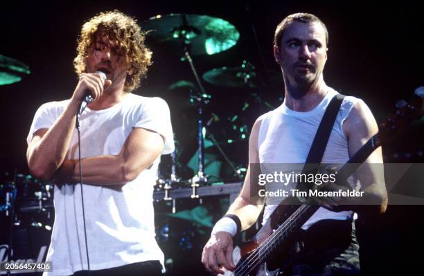 Michael Hutchence and Garry Gary Beers of INXS perform at San Jose Arena on April 8, 1994 in San Jose, California.