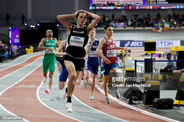 Gold medalist Geordie Beamish of Team New Zealand reacts after crossing the finish line to win the Men's 1500 Metres Final on Day Three of the World...
