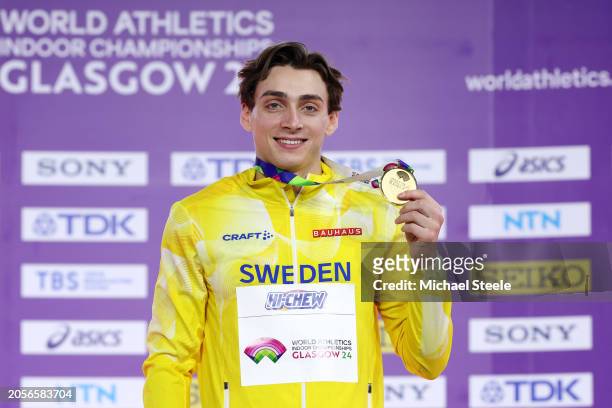Gold medalist Armand Duplantis of Team Sweden poses for a photo during the medal ceremony after the Men's Pole Vault Final on Day Three of the World...