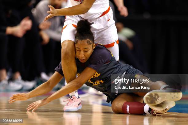 Yana Todd of the Boston College Eagles collides with Dayshanette Harris of the Clemson Tigers during the first half of the game in the First Round of...