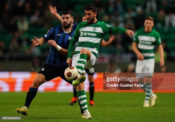 Paulinho of Sporting CP with Sead Kolasinac of Atalanta BC in action during the Round of 16 First Leg - UEFA Europa League 2023/24 match between...