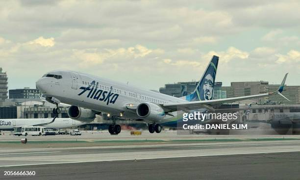 An Alaska airlines Boeing 737 is taking off from Los Angeles International AirPort in Los Angeles, California, on March 6, 2024.