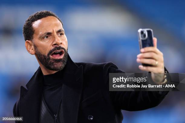Rio Ferdinand, presenter for TNT Sports take a selfie on an mobile phone ahead of the UEFA Champions League 2023/24 round of 16 second leg match...