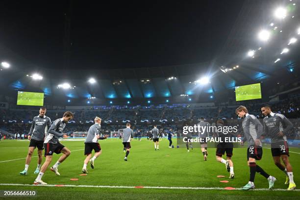 Copenhagen players warm up ahead of the UEFA Champions League round of 16, second-leg, football match between Manchester City and FC Copenhagen at...