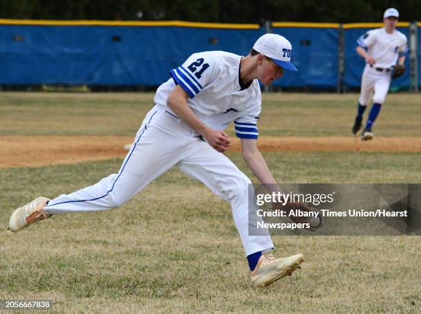 Saratoga Springs third baseman Ryan Ash grabs a grounder and throws out the runner at first during a baseball game against Shenendehowa on Thursday,...