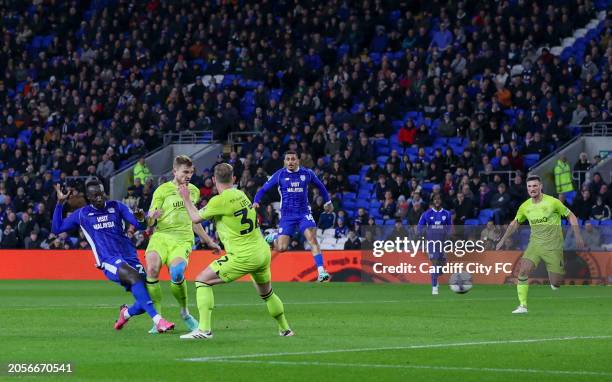 Famara Diedhiou of Cardiff City FC scores against Huddersfield Town during the Sky Bet Championship match between Cardiff City and Huddersfield Town...